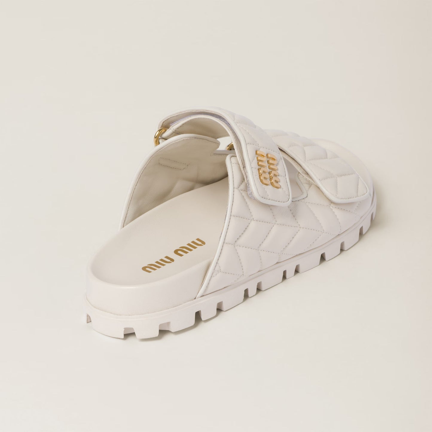 Matelassé nappa leather slides