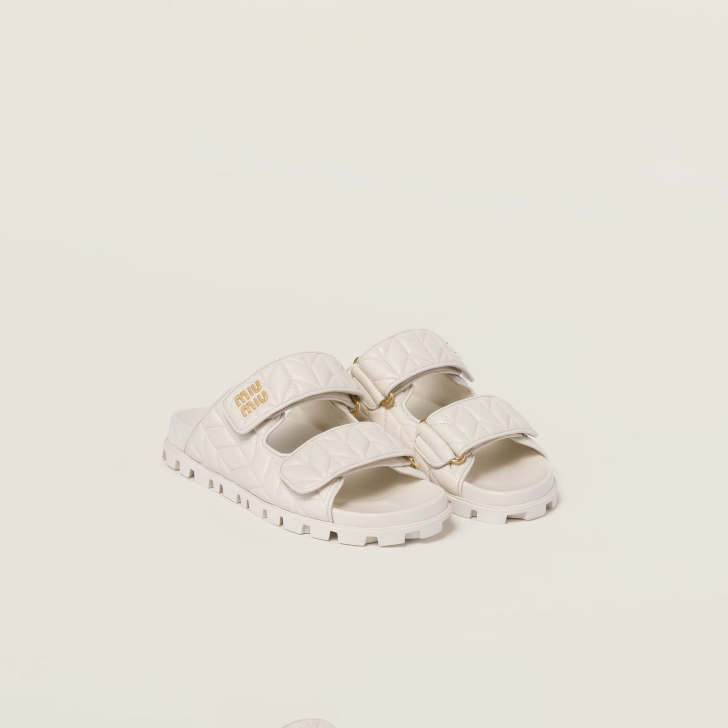 Matelassé nappa leather slides