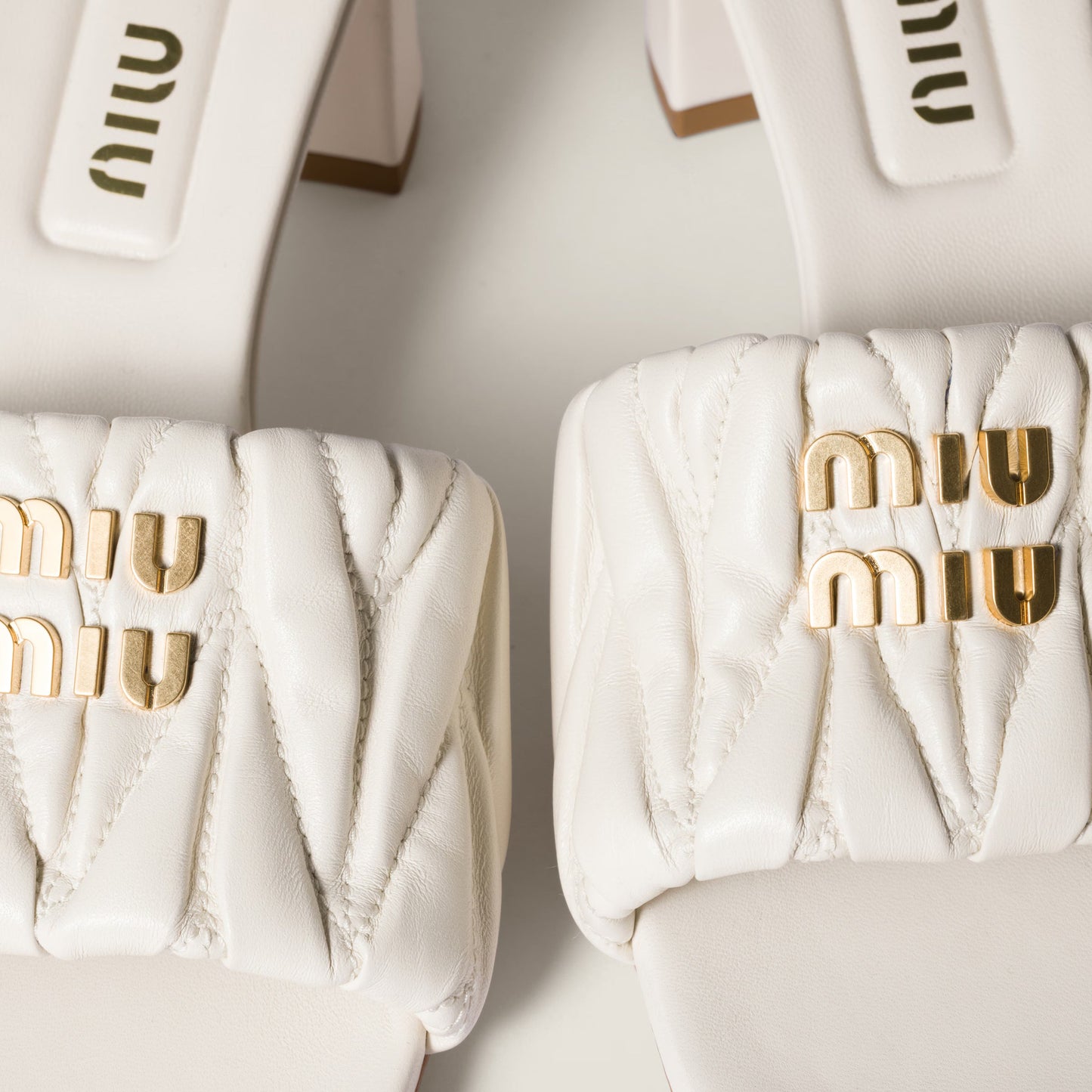 Matelassé nappa leather slides