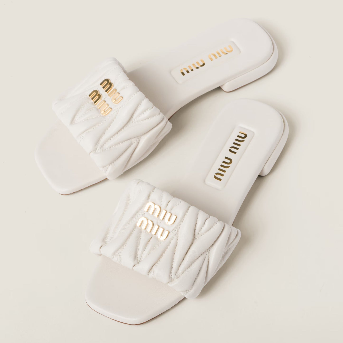 Matelassé nappa leather slides