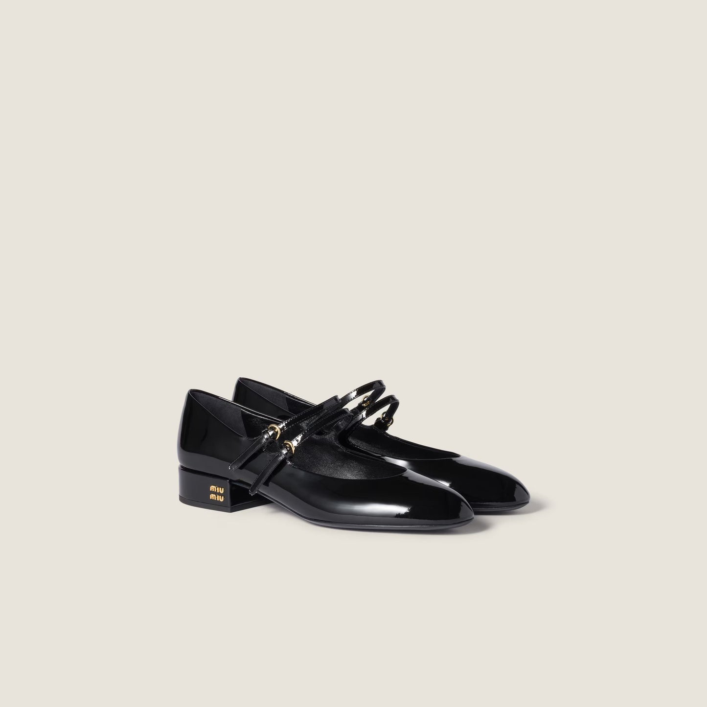 Patent-leather slingback court shoes with buckles
